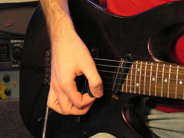 Постановка правой руки на гитаре